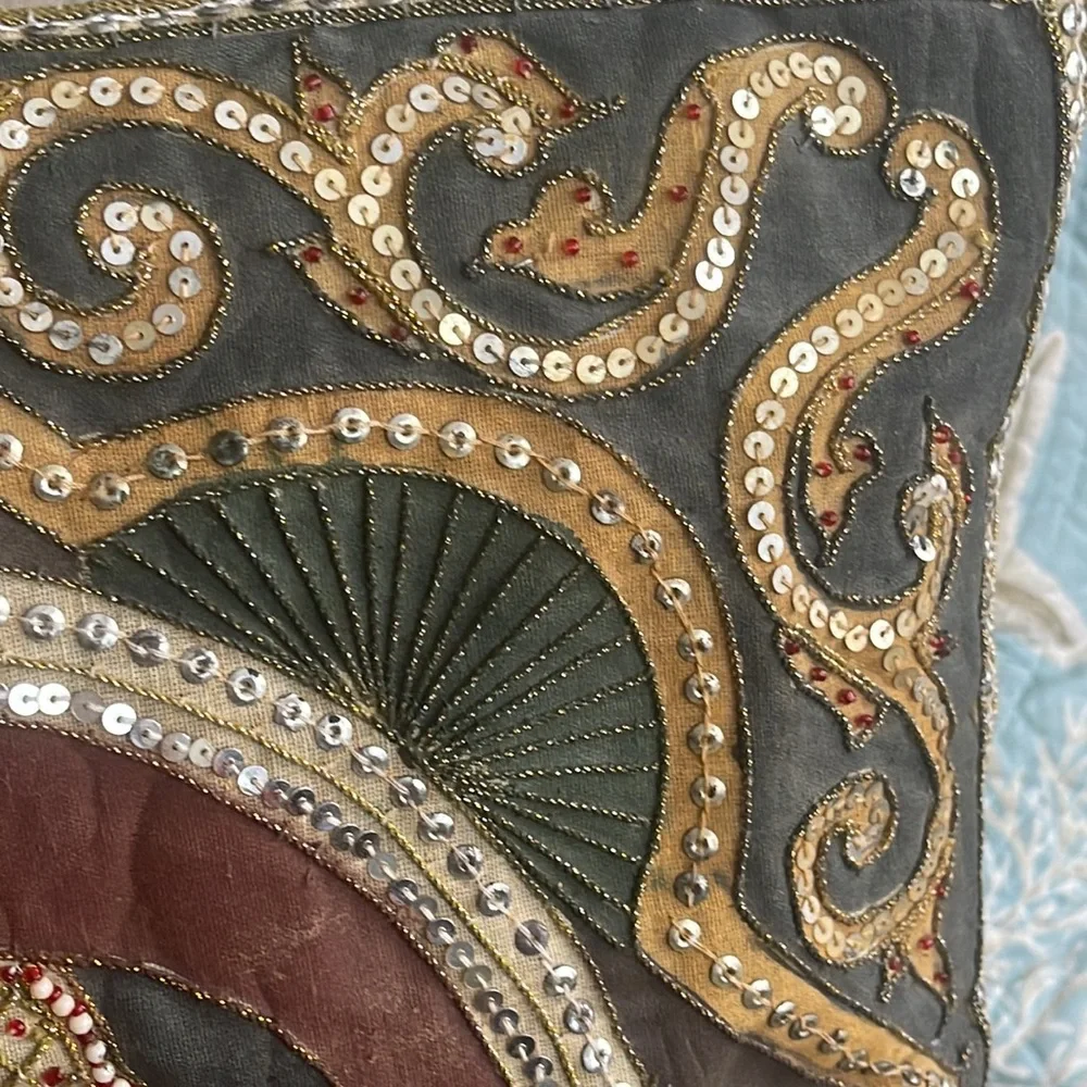 Elephant lovers this pillow is lovely exotic and quite intricate black silk back